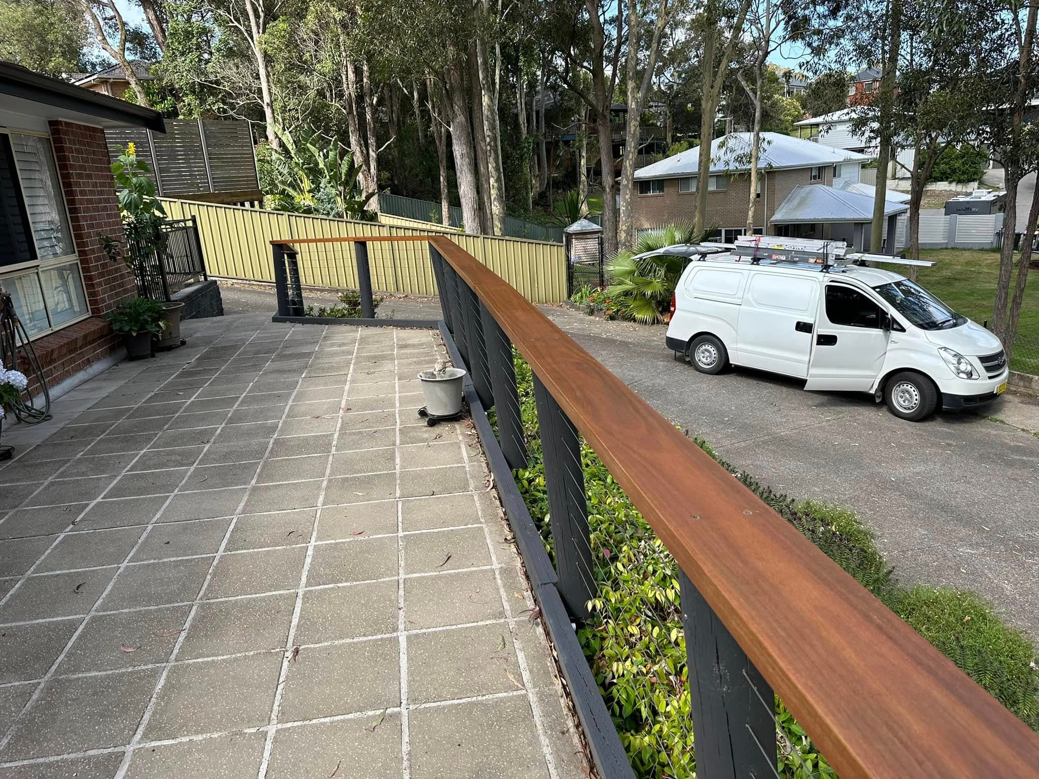 Timber-rail balustrade + paved entry